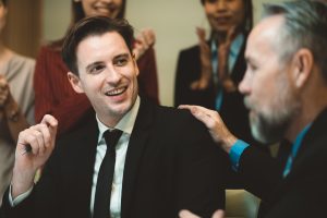 A leader giving another person room to lead